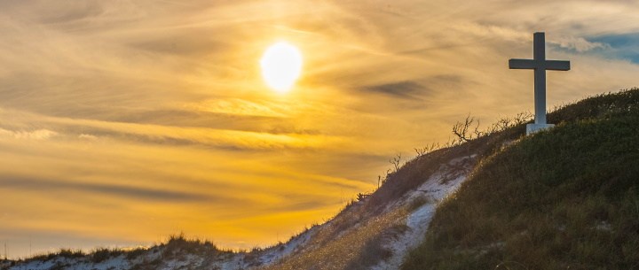 cross on beach dune